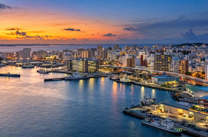 Naha coastal city skyline at dusk